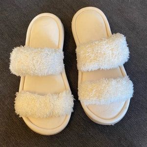 Cream fuzzy slippers. NWOT
